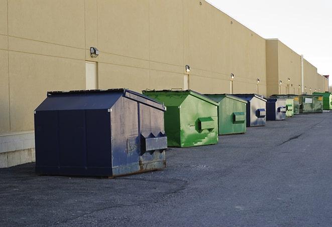 closed construction dumpster with a sign prohibiting unauthorized access in Blossom